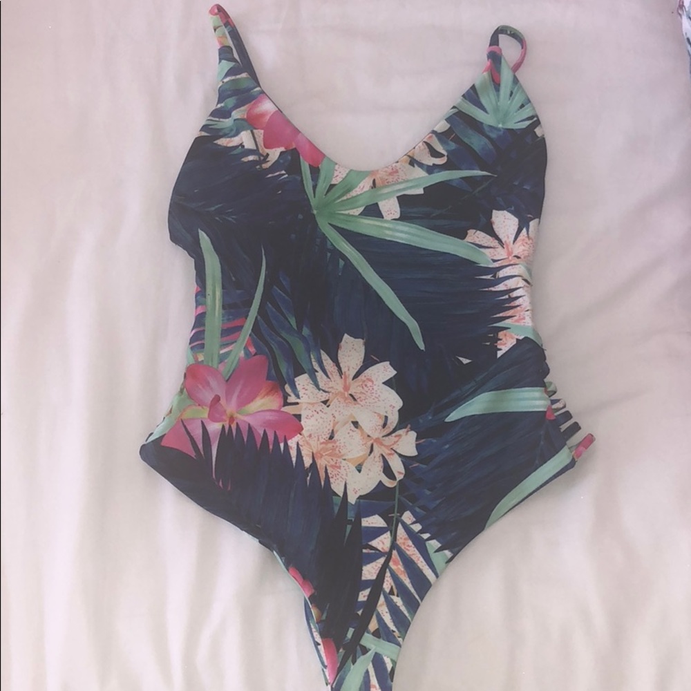 Stone Fox One piece size medium